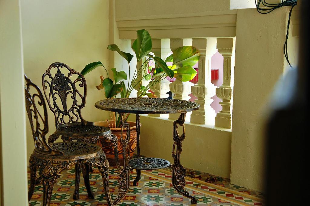 Palanquinn Heritage Suites Джорджтаун Номер фото